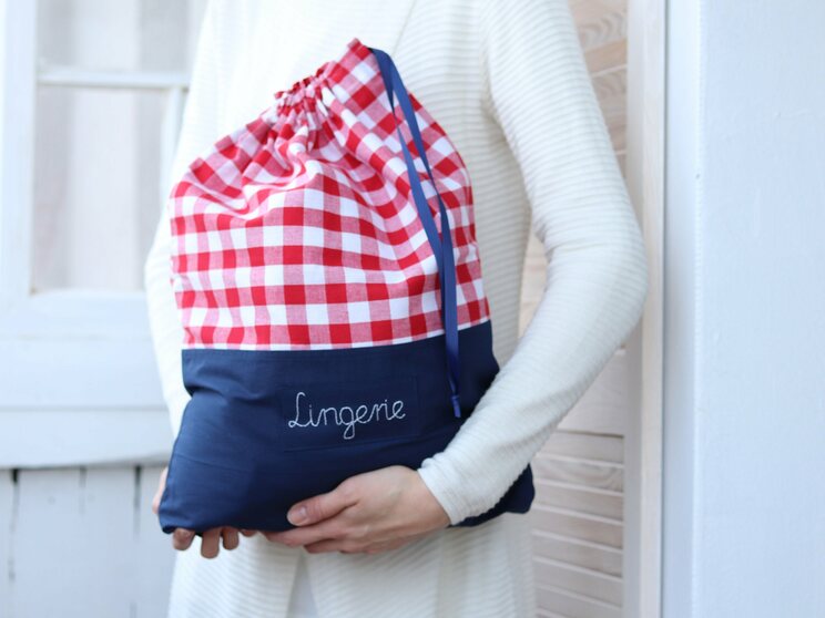 Red And White Checkered Travel Laundry Bag With Navy Blue Bottom